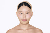 Gaine visage Poppy Cloudy portée par une modèle asiatique